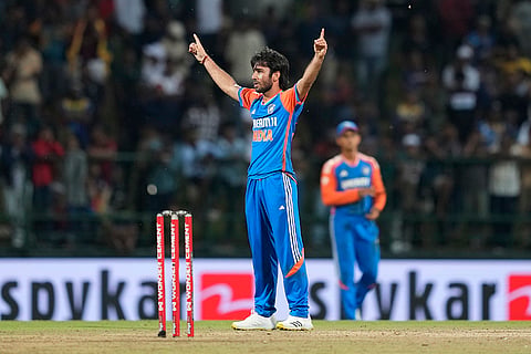 Ravi Bishnoi celebrates the wicket of Pathum Nissanka